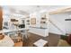 Open-concept living and dining area with modern decor, art, and a bright, airy atmosphere at 1718 W 33Rd Ave, Denver, CO 80211