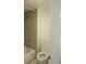 Cozy bathroom featuring a bathtub and shower with neutral-colored tile surround at 9725 E Harvard Ave # 346, Denver, CO 80231