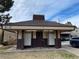 Centralized mailbox structure covered with a brown shingled roof at 9725 E Harvard Ave # 346, Denver, CO 80231