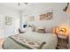 Bright bedroom showcases stylish decor, hardwood floors, and a serene atmosphere for relaxation and rest at 953 Kalamath St, Denver, CO 80204