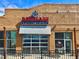 Exterior view of Renegade Brewing with open garage door and outdoor seating at 953 Kalamath St, Denver, CO 80204