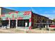 Unique commercial building with colorful and patterned exterior, adding character to the urban streetscape at 953 Kalamath St, Denver, CO 80204