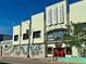 Denver Civic Theatre with a colorful mural of a dragon along the exterior wall at 953 Kalamath St, Denver, CO 80204