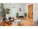 Stylish entryway showcasing hardwood floors, natural light, and decor accents that highlight the home's design at 953 Kalamath St, Denver, CO 80204