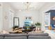 Inviting living room featuring stylish decor, hardwood floors, and an open layout at 953 Kalamath St, Denver, CO 80204