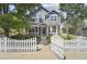 Charming home with a welcoming front porch and manicured front yard at 2120 Pintail Dr, Longmont, CO 80504
