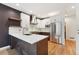 Bright kitchen featuring white cabinets, stainless steel appliances, and marble countertops at 2120 Pintail Dr, Longmont, CO 80504