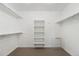Spacious walk-in closet with shelving and rod for ample storage and organization at 2120 Pintail Dr, Longmont, CO 80504