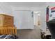 Bedroom with a closet and warm lighting, creating a comfortable and welcoming retreat with carpeted floor and fresh paint at 12277 W Chenango Dr, Morrison, CO 80465