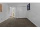 Bedroom with ample closet space and neutral carpeting offering a versatile and inviting space at 12277 W Chenango Dr, Morrison, CO 80465