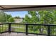 Spacious deck with serene views of the surrounding greenery, perfect for outdoor relaxation at 12277 W Chenango Dr, Morrison, CO 80465