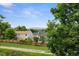 Residential area featuring a house with lush greenery and a mountain view, perfect for enjoying nature at 12277 W Chenango Dr, Morrison, CO 80465