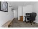 Bright office area featuring a sleek desk setup, wooden cabinets, and clean, modern design, perfect for a productive workspace at 12277 W Chenango Dr, Morrison, CO 80465