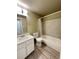 Bathroom features a shower-tub combination, and white sink and toilet at 8828 E Florida # 113, Denver, CO 80247