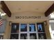 Close-up of building entrance at 580 S Clinton St with glass doors at 580 S Clinton St # 10D, Denver, CO 80247