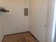 Small walk-in closet featuring a simple shelf system and bare floor at 580 S Clinton St # 10D, Denver, CO 80247