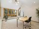 Bright office space with vaulted ceilings, a large window and a whiteboard at 10354 Georgia Cir, Morrison, CO 80465