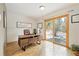 Well-lit home office with wood floors and walk-out to deck at 10354 Georgia Cir, Morrison, CO 80465