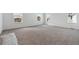 Spacious bedroom featuring multiple windows offering natural light and scenic views at 9253 Truckee Ct, Commerce City, CO 80022