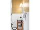 Charming powder room features patterned wallpaper, a modern vanity, and stylish fixtures at 3905 Tejon St, Denver, CO 80211