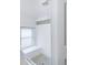 Bright bathroom featuring white subway tile, a small mosaic accent, and a shower bench at 3905 Tejon St, Denver, CO 80211