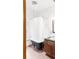 Bathroom with a claw foot tub and shower, wood vanity and sink at 3905 Tejon St, Denver, CO 80211
