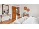 Stylishly decorated bedroom with hardwood floors and thoughtfully chosen decor creating a serene and inviting atmosphere at 3905 Tejon St, Denver, CO 80211