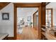 Open concept living with beautiful hardwood floors and detailed trim at 3905 Tejon St, Denver, CO 80211