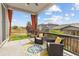 Patio seating area with a vibrant rug and views of the backyard at 9628 Albion Ln, Thornton, CO 80229
