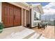 Inviting front porch with double doors and wooden chairs, perfect for relaxing at 14126 W Harvard Pl, Lakewood, CO 80228