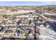 Aerial view of townhouses with snow on the ground at 19921 Victorian Way, Parker, CO 80138