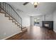 Living room featuring a fireplace and hardwood floors at 19921 Victorian Way, Parker, CO 80138