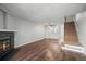 Spacious living room with fireplace and hardwood floors at 19921 Victorian Way, Parker, CO 80138