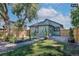 Charming backyard with a deck and well-maintained lawn at 1875 Jay St, Lakewood, CO 80214