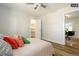 Bedroom with hardwood floors and access to a closet at 1875 Jay St, Lakewood, CO 80214
