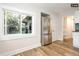 Modern kitchen features stainless steel appliances and light wood flooring at 1875 Jay St, Lakewood, CO 80214