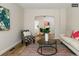 Living room features hardwood floors and a stylish rug at 1875 Jay St, Lakewood, CO 80214
