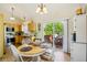Cozy dining area with sliding glass doors to outdoor deck at 16304 10Th St, Mead, CO 80542