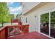 Exterior showcasing a two-story home with dual wooden decks and sliding glass doors at 16304 10Th St, Mead, CO 80542
