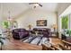 Spacious living area with hardwood floors and a ceiling fan at 16304 10Th St, Mead, CO 80542