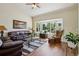 Bright living room featuring a bay window and hardwood floors at 16304 10Th St, Mead, CO 80542