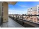 Enjoy stunning views from this condo's spacious balcony with glass railings and city views at 20 Wilcox St # 403, Castle Rock, CO 80104