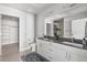 Stylish bathroom with double vanity, sleek fixtures, walk-in shower and ample storage at 20 Wilcox St # 403, Castle Rock, CO 80104