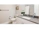 Clean bathroom with single vanity, toilet, and shower/tub combo at 20 Wilcox St # 403, Castle Rock, CO 80104