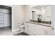 Double vanity bathroom with a walk-in shower and modern finishes at 20 Wilcox St # 403, Castle Rock, CO 80104