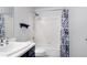 Bathroom featuring a shower over bath and modern sink at 19135 E Hickock Dr, Parker, CO 80134