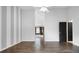 Spacious bedroom with high ceilings, wood floors, and an ensuite bathroom at 19135 E Hickock Dr, Parker, CO 80134