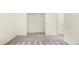 A well-lit bedroom with neutral walls and patterned carpeting at 19135 E Hickock Dr, Parker, CO 80134
