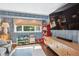 Play room with hardwood floors, blue stripe wallpaper, and large window at 225 N Ivanhoe St, Denver, CO 80220