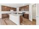 Stylish kitchen with quartz countertops, stainless steel appliances, and ample cabinet space at 9303 Biscay St, Commerce City, CO 80022